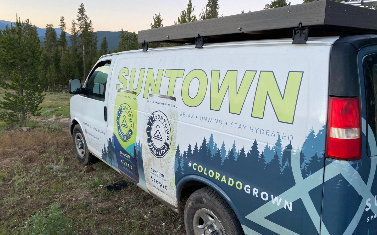 Image of a wrapped CBD sparkling water company's van