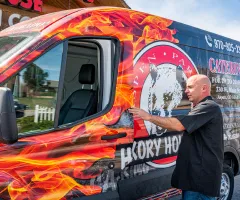 Image of a wrapped Hickory House BBQ van