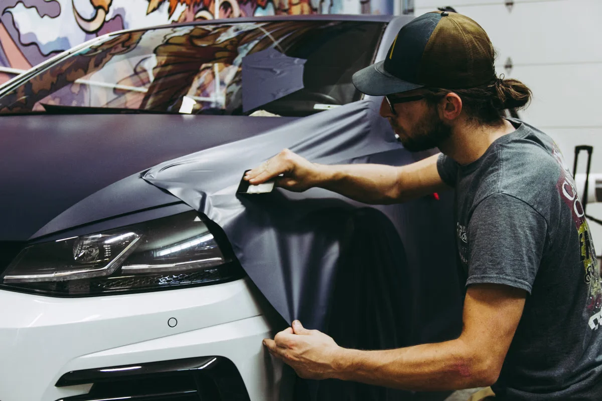 Vehicle wrap vinyl material being applied